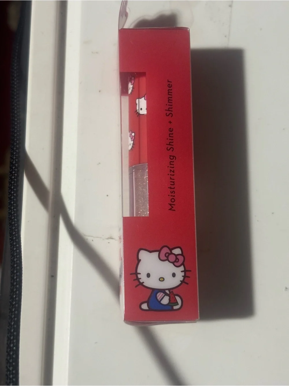Hello Kitty Kawaii Kiss Lip Oil - Red Packaging & Clear Shimmer
